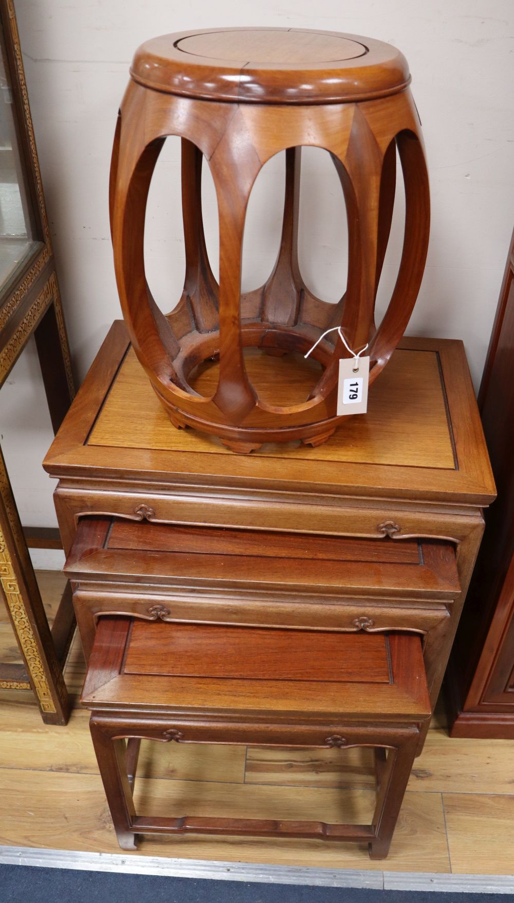 A Chinese hardwood jardiniere stand and a nest of tables, tables width 56cm, depth 38cm, height 60cm